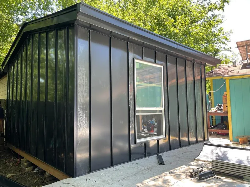 Black standing seam metal wall panels for Metal Roof Installation in Columbia City