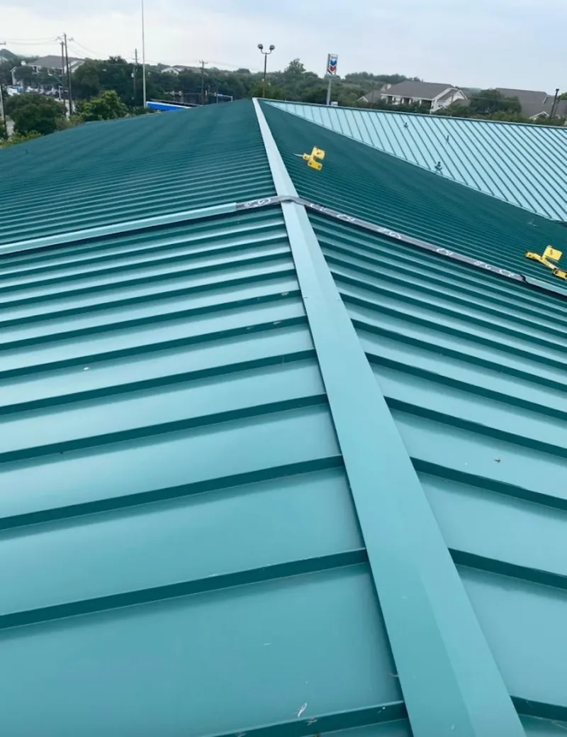 Green commercial metal roof ridge and valley for Metal Roof Repair in Columbia City